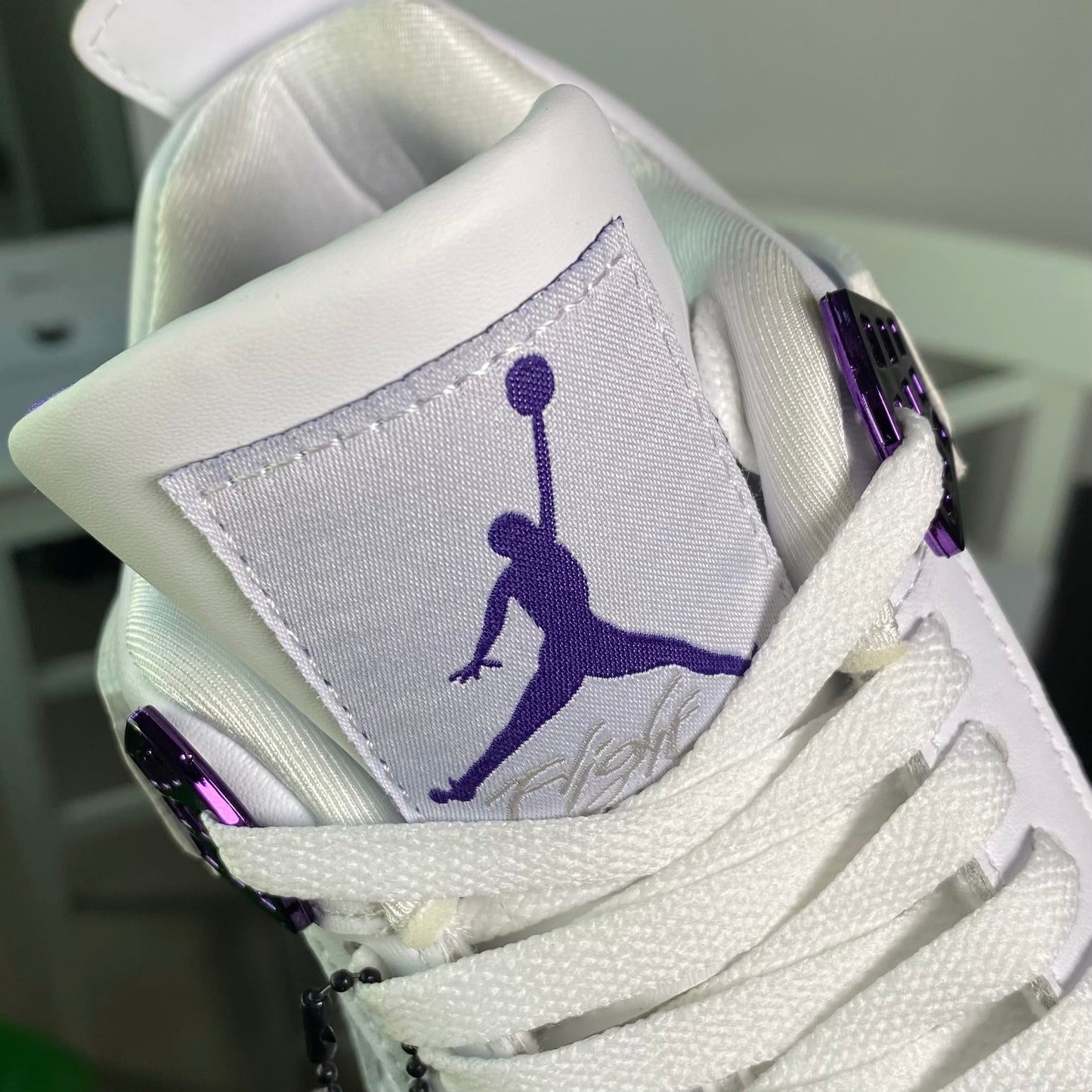 Air Jordan 4 Retro “Metallic Purple”