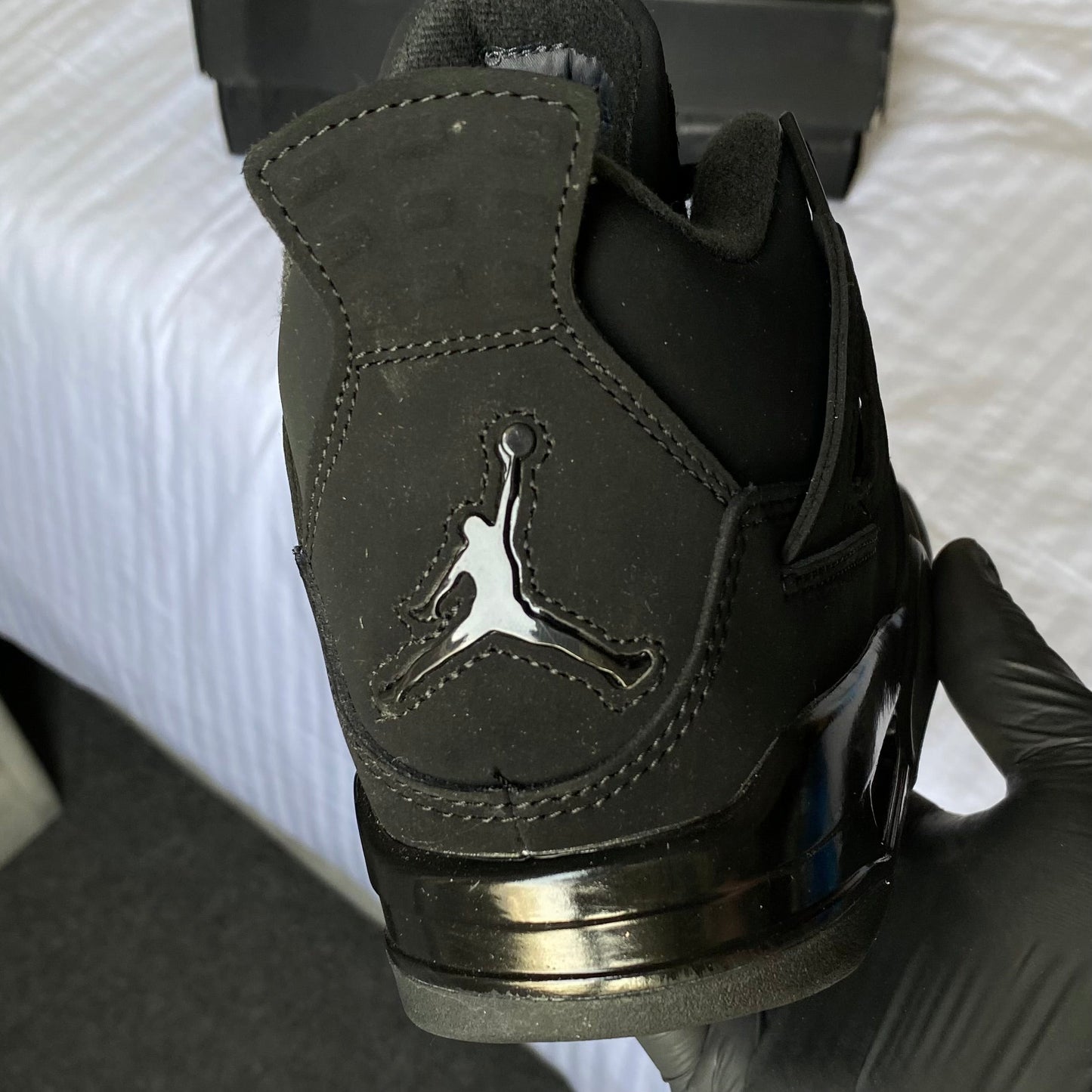 Air Jordan 4 Retro “Black Cat”