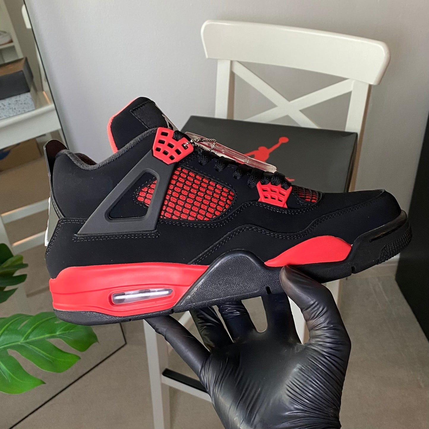 Air Jordan 4 Retro “Red Thunder”