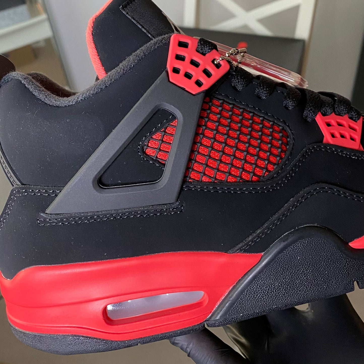 Air Jordan 4 Retro “Red Thunder”