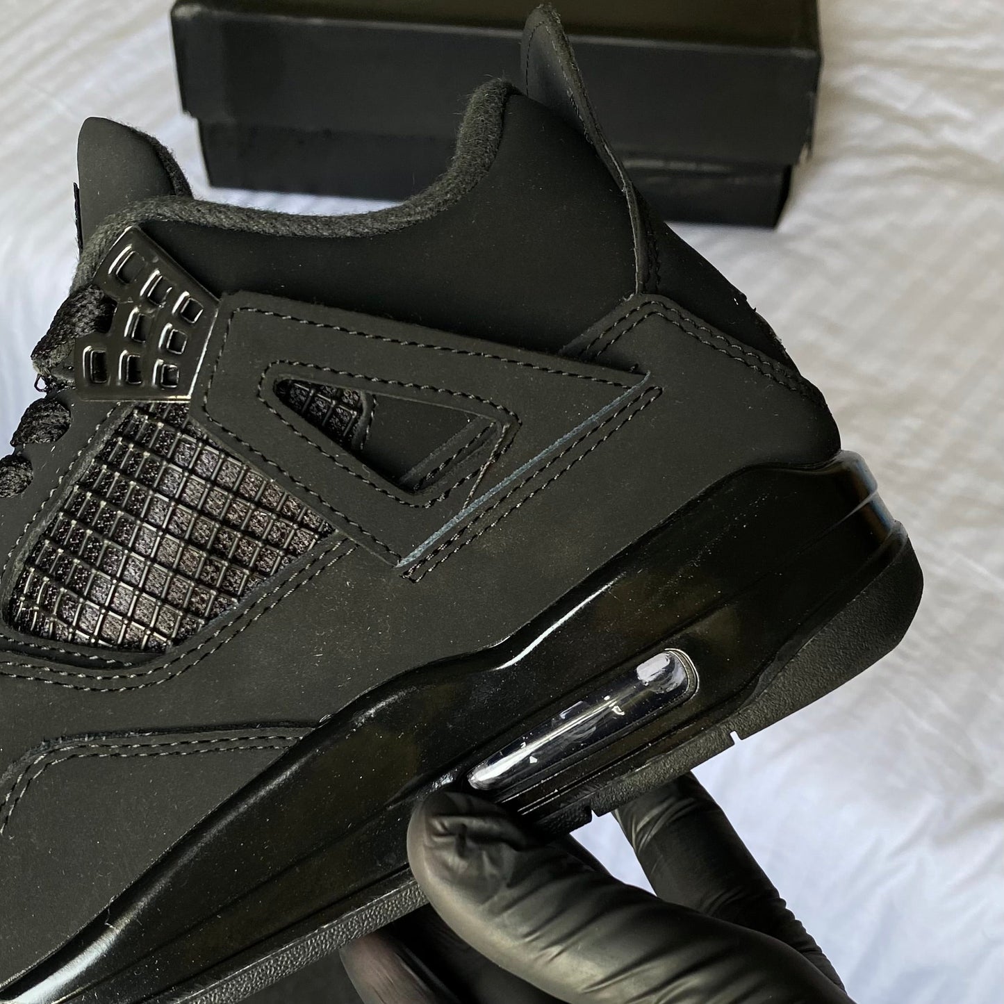 Air Jordan 4 Retro “Black Cat”